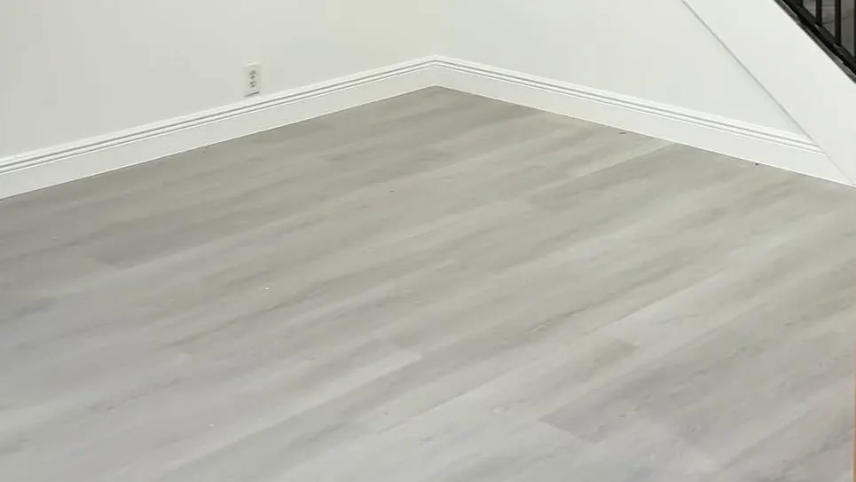 Finished light-tone flooring installation in a South Florida home